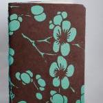 Blue Cherry Blossoms On Brown Paper Journal